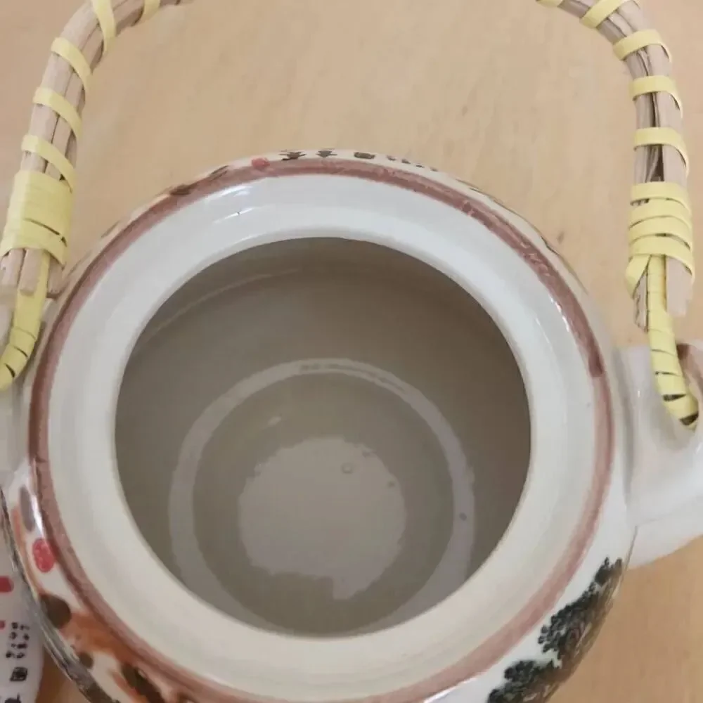 Chinese ceramic tea pot with strainer